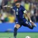 Raphinha em ação pela seleção brasileira