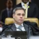 André Mendonça sentado à bancada durante sessão.